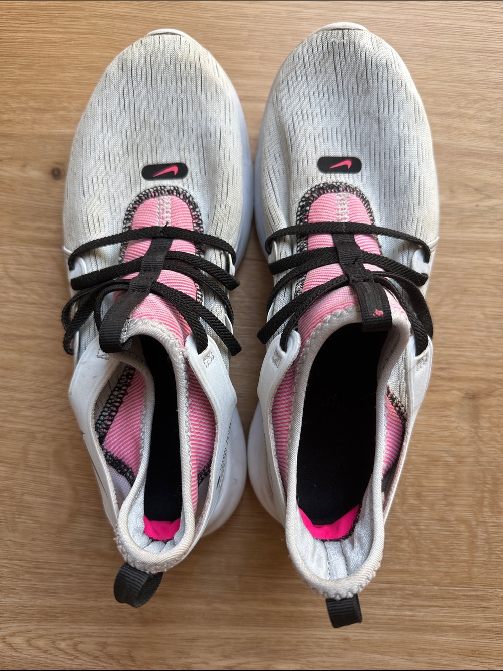 Nike Women’s White and Pink Athletic Sneakers with Black Laces